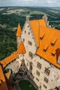 Bouzov,Czech Republic-July 8, 2021.Aerial view of romantic fairytale castle with eight-storey watchtower built in 14th century. Royalty Free Stock Photo