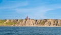 Bovbjerg lighthouse and cliffs from North Sea, Ferring, Lemvig, Mid Jutland, Denmark Royalty Free Stock Photo