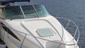 Bow of beautiful white trip yacht floating on dock. Sunny day. close up