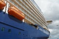 Bow of blue passenger cruise ship Celebrity Silhouette moored from starboard side in port of Castries, St Lucia. Royalty Free Stock Photo