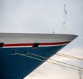 Bow of a blue red and white cruise ship at port.. Royalty Free Stock Photo