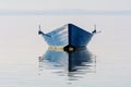 Bow of the boat is reflected in the water Royalty Free Stock Photo