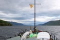 Front of boat sailing in choppy lake Royalty Free Stock Photo