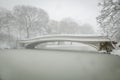 Bow Bridge covered in snow, Central Park, NYC Royalty Free Stock Photo