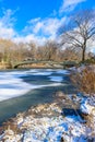 Bow bridge in the winter at sunny day, Central Park, Manhattan, New York City, USA Royalty Free Stock Photo