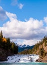 Bow Falls in Banff, Alberta, Canada under bright, sunny, blue fall skies Royalty Free Stock Photo