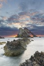 Bow-fidle Rock sunrise landscape on the coast of Scotland on cloudy morning Royalty Free Stock Photo