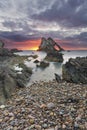 Bow-fidle Rock sunrise landscape on the coast of Scotland on cloudy morning Royalty Free Stock Photo