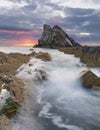 Bow-fidle Rock sunrise landscape on the coast of Scotland on cloudy morning Royalty Free Stock Photo