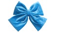 Bow hair with tails in beautiful color made out of velvet fabric. Royalty Free Stock Photo