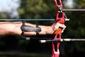 Bow hunter hands holding compound bow Royalty Free Stock Photo
