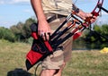 Bow hunter hands holding compound bow Royalty Free Stock Photo