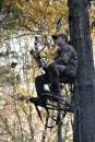 Bow Hunter Waiting in Tree Stand Royalty Free Stock Photo