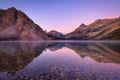 Bow lake. Mountain landscape at dawn. Sunbeams in a valley. Lake and forest in a mountain valley at dawn. Natural landscape with b Royalty Free Stock Photo