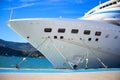 The bow of a large white cruise ship moored at the port Royalty Free Stock Photo