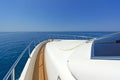 Bow of a luxury motor yacht cruising the blue sea. Royalty Free Stock Photo