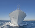 Bow of luxury private motor yacht under way sailing at sea Royalty Free Stock Photo