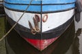 Bow of an old ship  moored in harbor Royalty Free Stock Photo