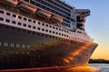 The bow of Queen Mary 2 ocean liner at sunset Royalty Free Stock Photo