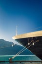 Bow, rat guards and mooring lines of berthed cruise ship,, Alaska, USA. Royalty Free Stock Photo