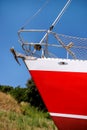 Bow of red and white sailboat, close up Royalty Free Stock Photo