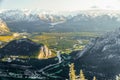 Bow River, Banff and other town in a valley surrounded by high mountain ranges in the Canadian Rockies Royalty Free Stock Photo