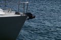 Bow of a sailing yacht against the blue sea with anchor at the bow. copy space, selective focus, narrow depth of field. Royalty Free Stock Photo