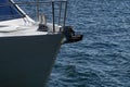 Bow of a sailing yacht against the blue sea with anchor at the bow. copy space, selective focus, narrow depth of field Royalty Free Stock Photo