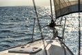 Sailing into the sunset on a sailing yacht Royalty Free Stock Photo