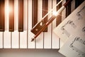 Bow with sheet music on piano keys top Royalty Free Stock Photo