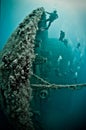 Bow of ship wreck with divers Royalty Free Stock Photo