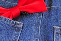 Bow tie and blue jeans Royalty Free Stock Photo