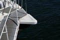 Bow of a white sailing yacht against the blue sea with bridge at the bow. copy space, selective focus, narrow depth of field. Royalty Free Stock Photo