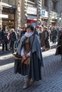 Bow woman in medieval costume at traditional parade of Epiphany Befana medieval festival in Florence, Tuscany, Italy.