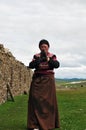 Bowed praying tibetan girl Royalty Free Stock Photo