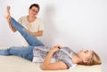 Bowen therapist giving a massage treatment to a young woman Royalty Free Stock Photo