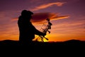 Bowhunter Glassing in Sunset