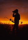 Bowhunter in Sunset