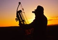 Bowhunter in Sunset