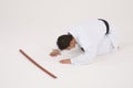 Bowing male in Karate uniform