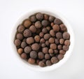 Bowl of allspice berries Royalty Free Stock Photo