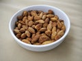 Bowl of almonds on canvas Royalty Free Stock Photo