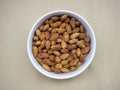 Bowl of almonds on canvas Royalty Free Stock Photo