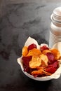 Bowl of appetizing crisp beetroot chips Royalty Free Stock Photo