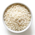 Bowl of Arborio short grain white rice on white from ab