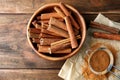 Bowl with aromatic cinnamon sticks and powder Royalty Free Stock Photo