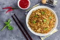 A Bowl of Asian Chicken Fried Rice with Veggies and Scrambled Eggs Royalty Free Stock Photo