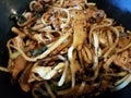 Bowl of asian noodles and chicken and bamboo