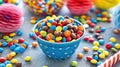 a bowl of assorted candy on a festive table, surrounded by decorations Royalty Free Stock Photo