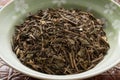 Bowl with Bancha Houji Cha, Japanese roasted tea close up